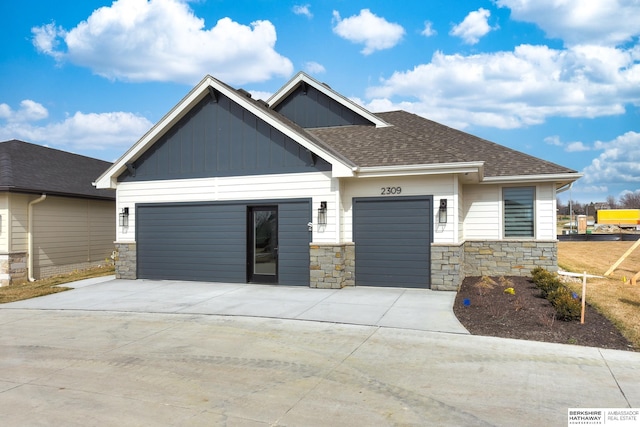 craftsman-style home featuring a garage