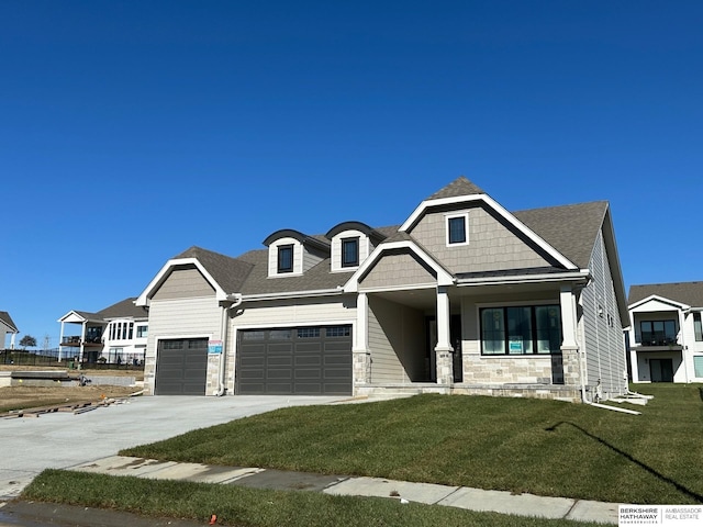 view of front of house featuring a front yard and covered porch