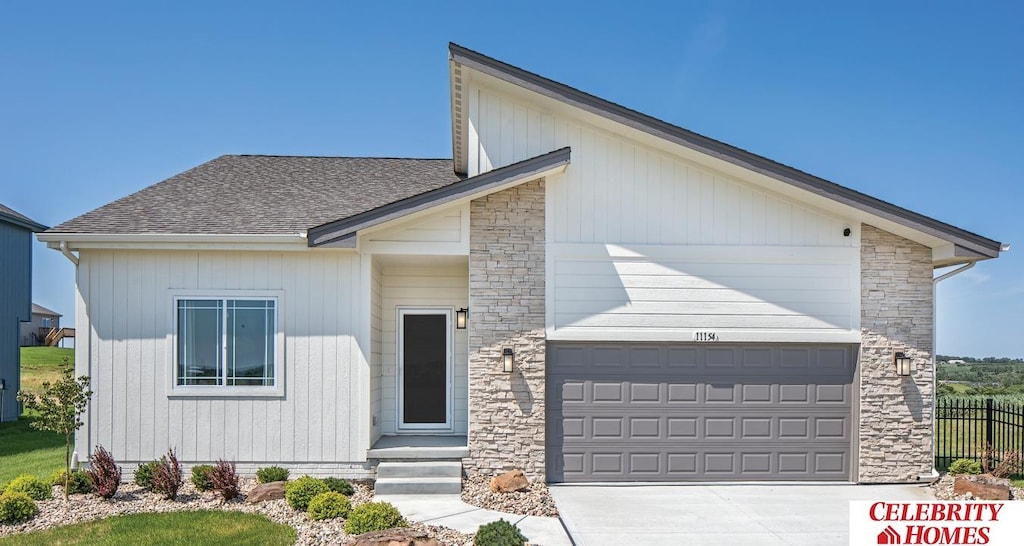 view of front of property featuring a garage