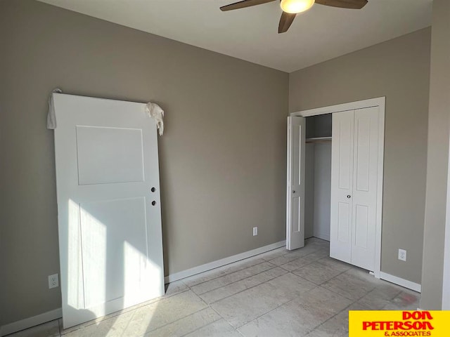 unfurnished bedroom with light tile floors, a closet, and ceiling fan