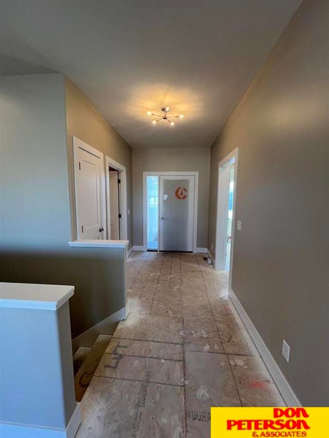 hallway featuring a wealth of natural light