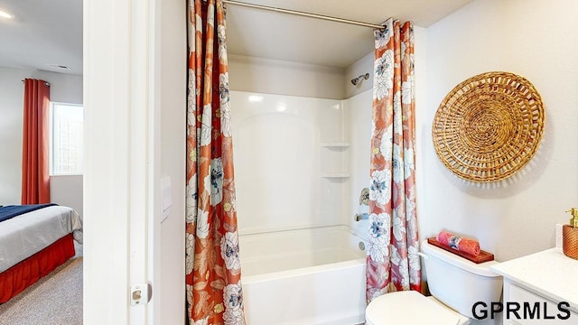 full bathroom featuring vanity, toilet, and shower / tub combo with curtain