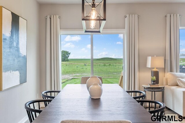 dining room featuring a notable chandelier