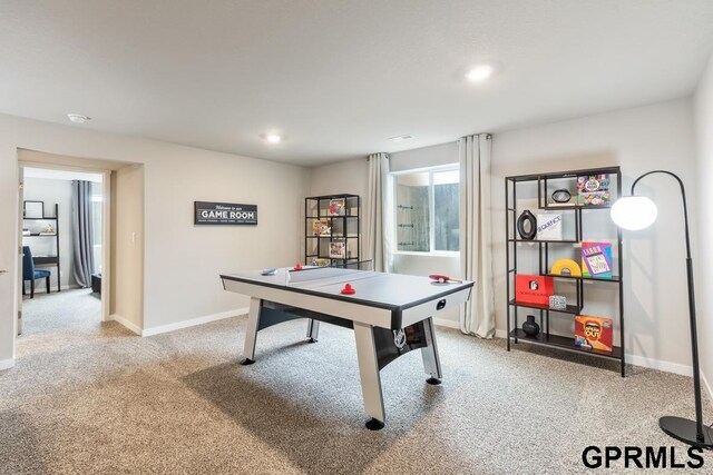 playroom featuring light colored carpet