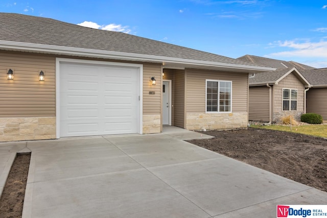 single story home with a garage