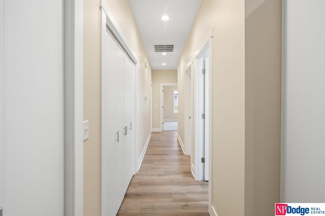 hallway featuring light wood-type flooring