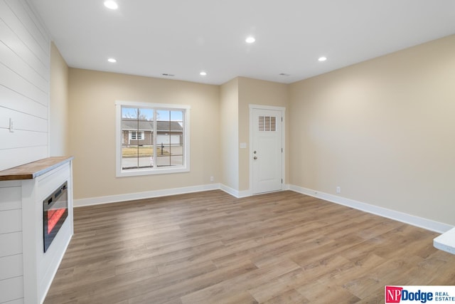 interior space with light hardwood / wood-style floors