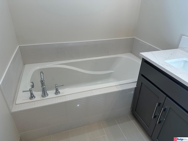 bathroom with tile patterned floors and vanity