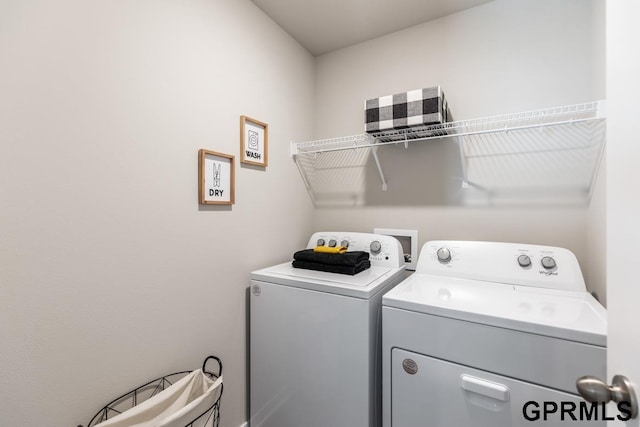 laundry area featuring washer hookup and washer and clothes dryer