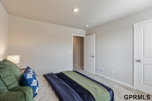 bedroom with light carpet