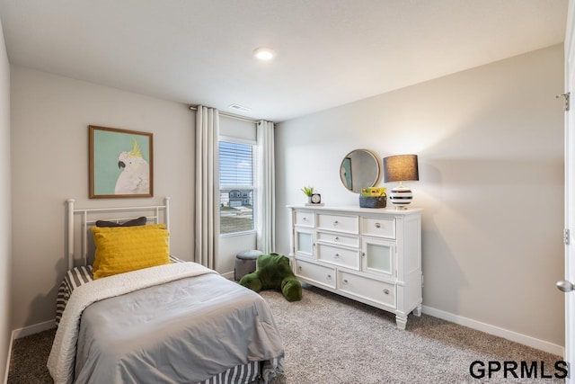 bedroom with light carpet