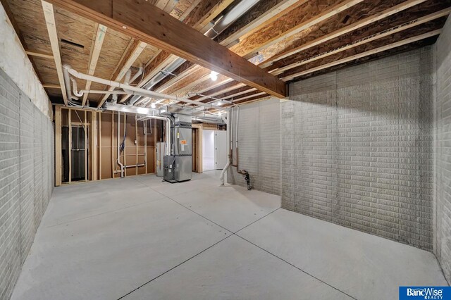 basement with heating unit