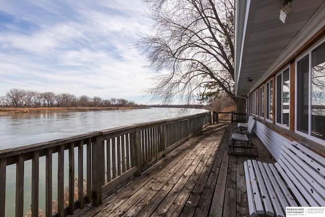 deck featuring a water view