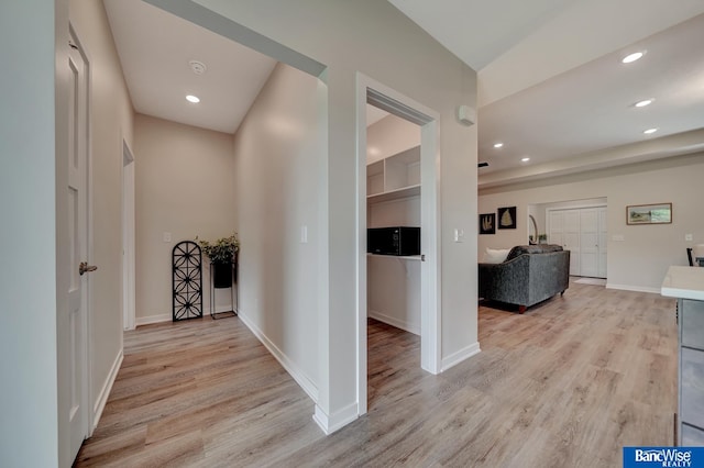 hall featuring light hardwood / wood-style flooring