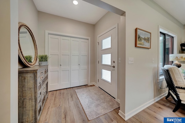 entrance foyer featuring light wood-type flooring