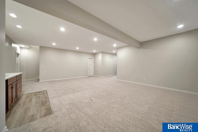 basement with light carpet