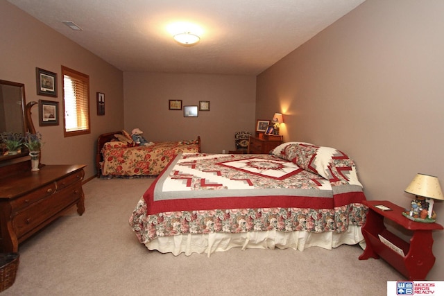 bedroom featuring carpet flooring