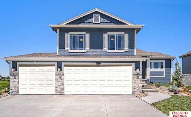 view of front of home with a garage