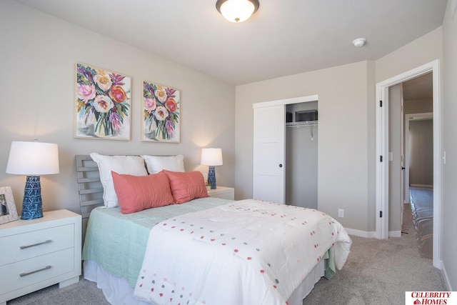 bedroom featuring light carpet and a closet