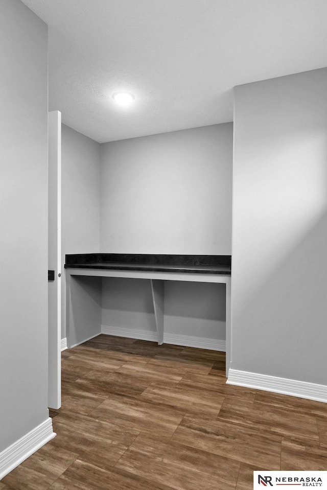 interior space with dark wood-type flooring