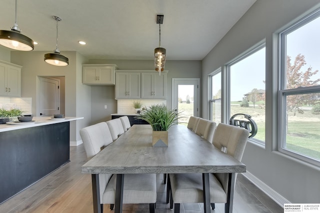 dining room with light wood-type flooring