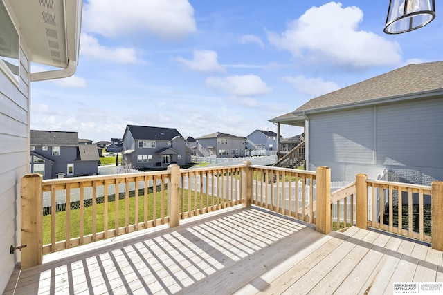 deck featuring a lawn