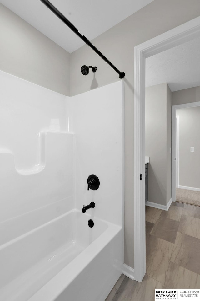 bathroom featuring shower / bath combination