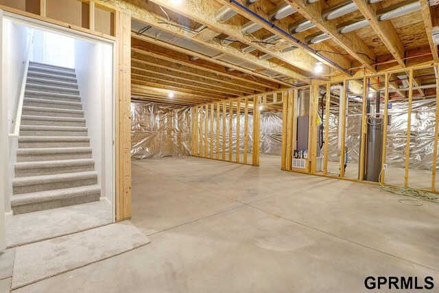 basement featuring gas water heater