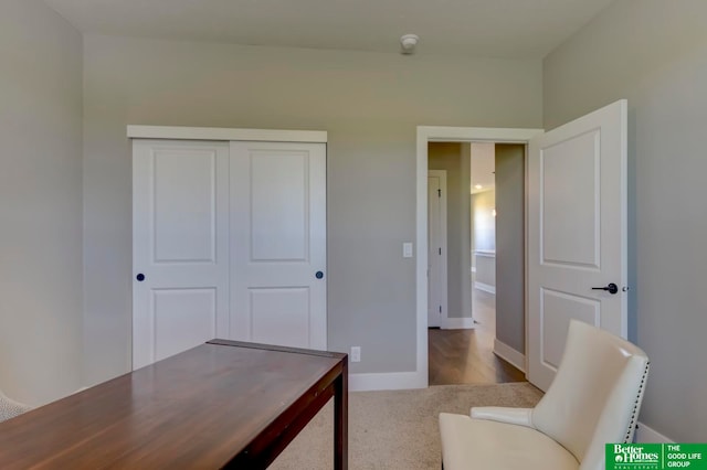 home office with carpet flooring