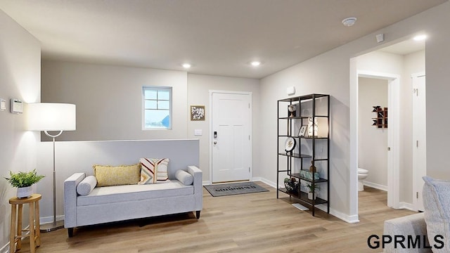 entryway with light hardwood / wood-style flooring