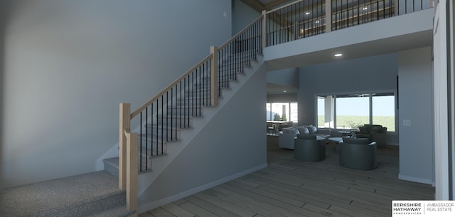 22742 Sanctuary Ridge Dr, Elkhorn, NE 68022 - stairway with wood-type flooring and a high ceiling