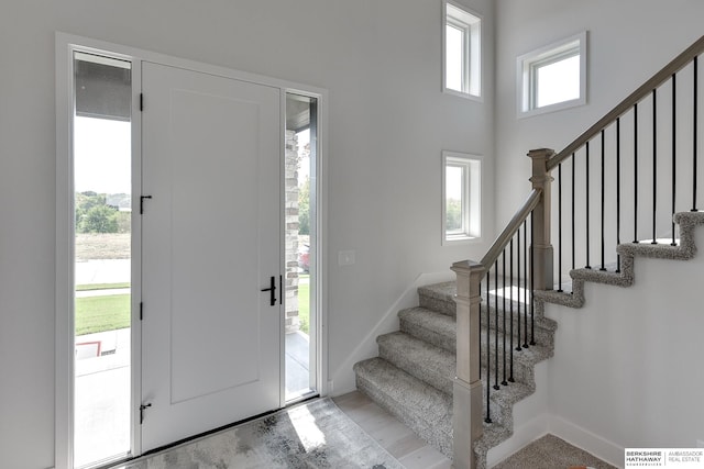 foyer entrance featuring a wealth of natural light