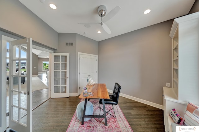 home office with dark hardwood / wood-style flooring, ceiling fan, french doors, and lofted ceiling