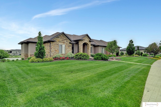 view of front of home with a front yard