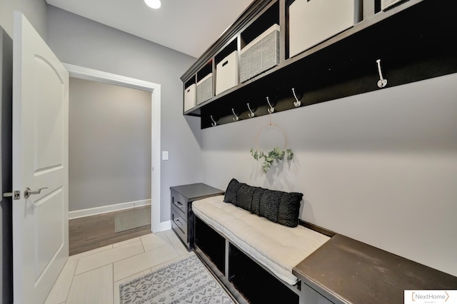 mudroom featuring light tile patterned floors