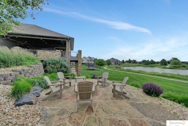 view of patio featuring a water view