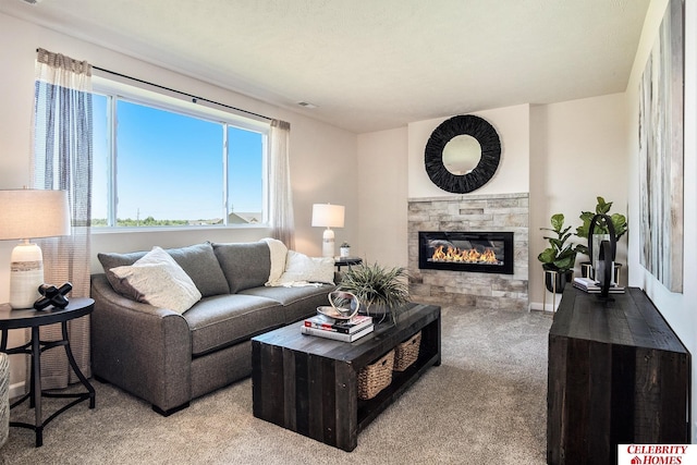 carpeted living room with a fireplace