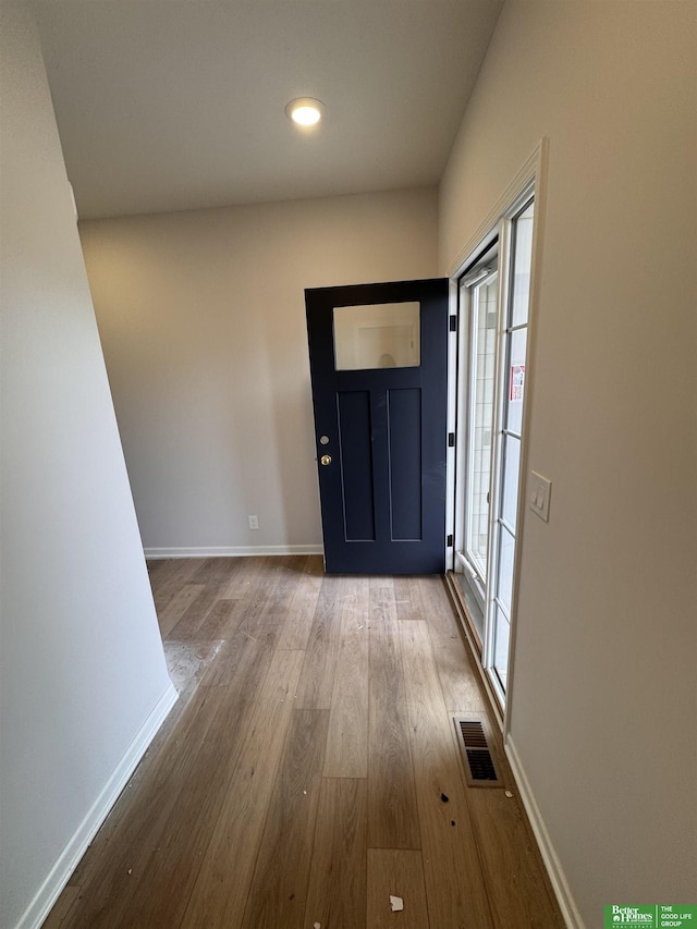 entrance foyer featuring light hardwood / wood-style floors