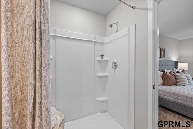 bathroom featuring a shower with curtain