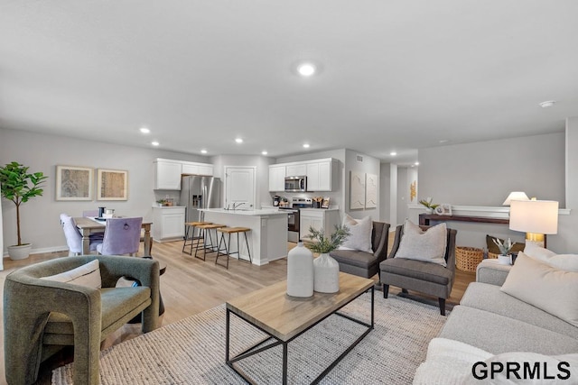 living room with light wood-type flooring