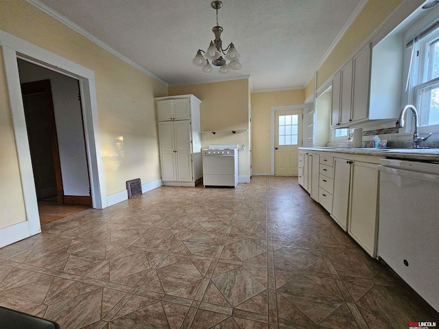 kitchen with decorative light fixtures, dishwashing machine, a wealth of natural light, and white cabinetry