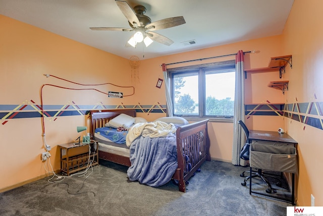 bedroom with ceiling fan and carpet floors