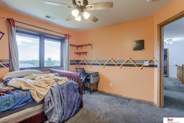 carpeted bedroom with ceiling fan