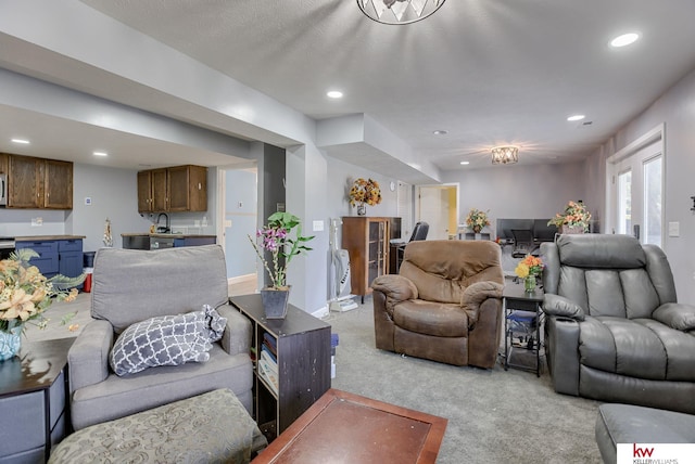 living room featuring light colored carpet