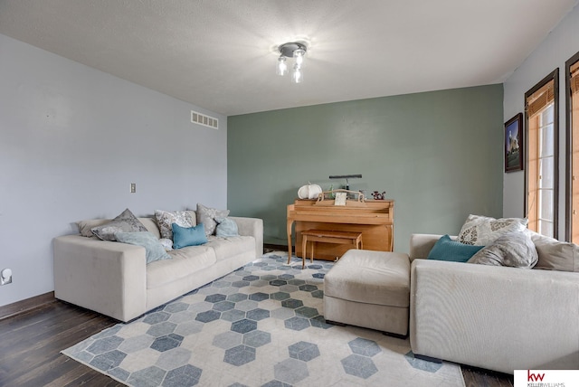 living room featuring dark wood-type flooring