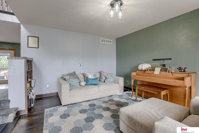 living room with dark hardwood / wood-style floors