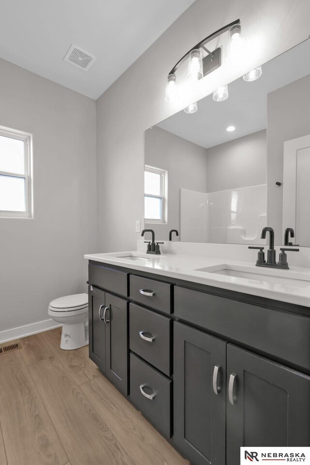 kitchen featuring backsplash, white cabinetry, wall chimney exhaust hood, and stainless steel gas stovetop