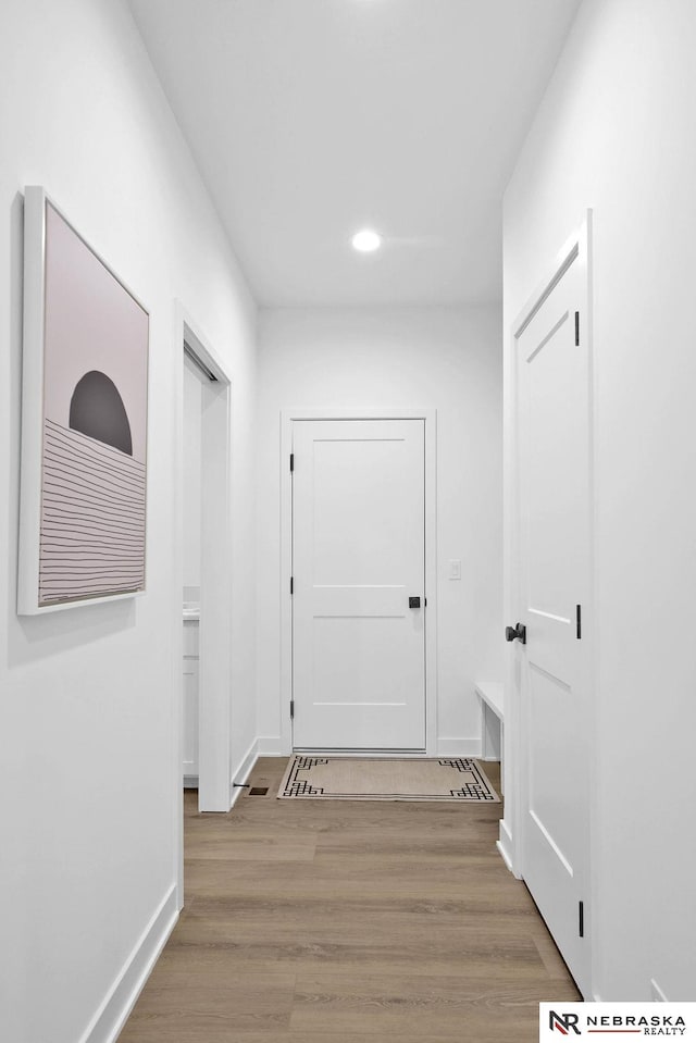 hall featuring light wood-type flooring