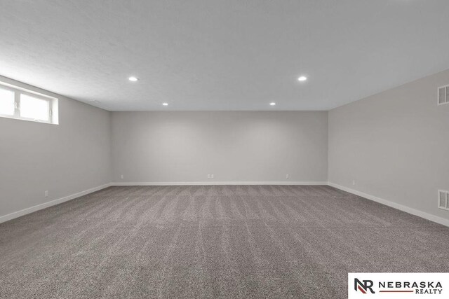 foyer with a notable chandelier, light hardwood / wood-style flooring, and a tray ceiling