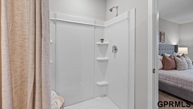 bathroom with a shower with shower curtain